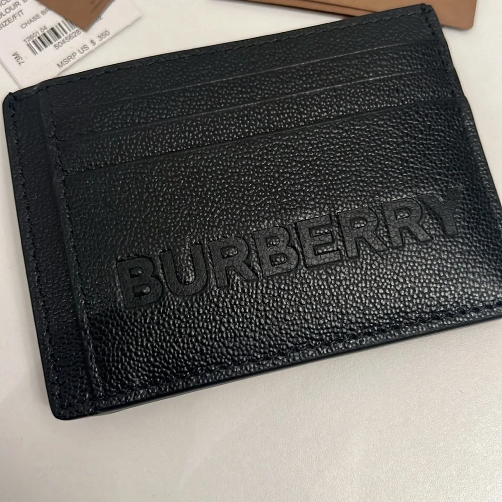BURBERRY BLACK CARD HOLDER with money clip Comes with a dust Bag and plastic